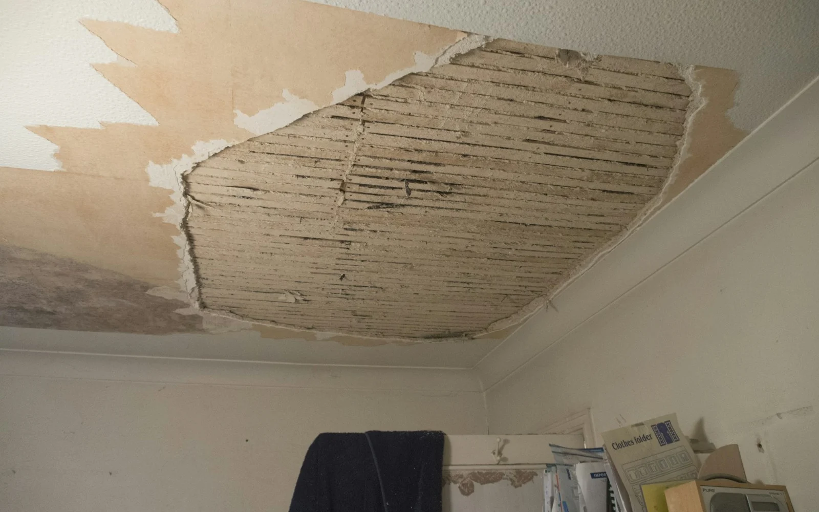 False Ceiling Water Damage: Sagging & Stains